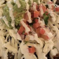 Burrito Bowl · your choice of meat served in a bowl with refried beans, lettuce, pico de gallo, mozzarella,...