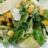 Caesar Salad · Served with chicken.