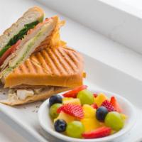 Turkey & Brie · Sliced in-house turkey, creamy brie, spinach, tomato and scratch-made pesto mayo pressed on ...