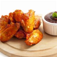 Mild- Garlic Parm Bone-In Wings · Delicious traditional wings tossed in mild garlic parm sauce made to perfection and crisp.
