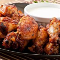 Mild Teriyaki Bone-In Wings · Delicious traditional wings tossed in mild teriyaki sauce made to perfection and crisp.