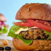 Black Bean Burger · Healthy vegetarian option with a plant based version patty filled with black beans, carrots,...