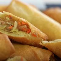 Thai Spring Rolls · Cabbage, carrot, celery, glass noodles in crispy spring roll wrap, with sweet & sour sauce.