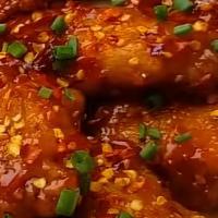 Sweet Chili Wings · Fried seasoned wings, toss in sweet chili sauce. Mild.