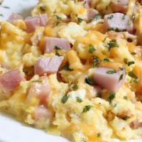 2 Scrambled Eggs With Side Of Ham · With cafe con leche.