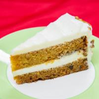 Carrot Cake · Fresh carrots, coconut, walnuts, pineapple and raisins make this delicious carrot cake super...