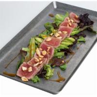 Tataki · Seared tuna, avocado, orange honey, lemon, soy, toasted peanuts.