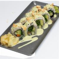 Veg Roll · Cucumber, mixed greens, carrots, avocado, and peanuts topped with our signature Cilantro Sau...