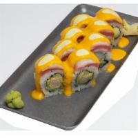Samba Roll · Crispy shrimp, avocado and cucumber, topped with fresh tuna and white fish, finished with ou...