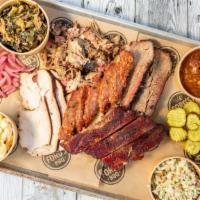 Pitmaster Platter · All hot meats and 4 sides!! Sandwich portion of pork, turkey, and brisket with 4 wings and 4...