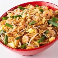 Pad Thai · Your choice of protein in a Pad Thai sauce, with crushed red pepper, fried egg, onions, bean...