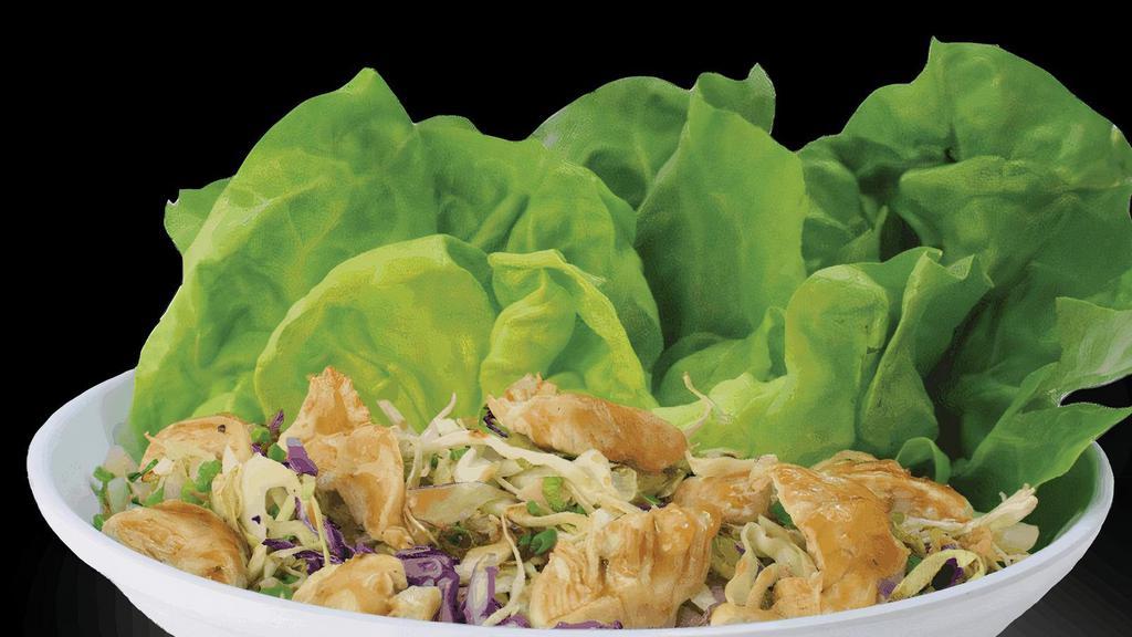Chicken Lettuce Wraps · Seared Chicken tossed with water chestnuts, fresh garlic, green onions, fresh ginger, cabbage and a blend of our Island Teriyaki and Kung Pao sauce. Served with crisp lettuce.