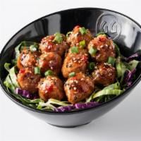 Dragon Balls · A dozen juicy meatballs tossed with our signature spicy Dragon sauce.