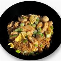 Kids Chicken Fried Rice · Chicken tossed with our signature Fried Rice recipe, with egg and green onions.