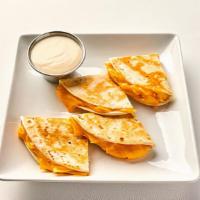 Kids Quesadilla · NEW! Gooey cheeses served between two flour tortillas and grilled to perfection, served with...
