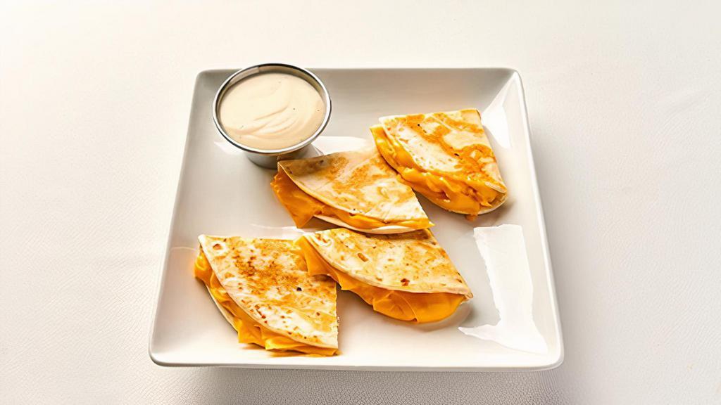 Kids Quesadilla · NEW! Gooey cheeses served between two flour tortillas and grilled to perfection, served with Ranch. Served with choice of drink.
