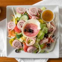 Antipasto Salad · Lettuce, tomatoes, black olives, ham, pepperoni and mozzarella cheese.