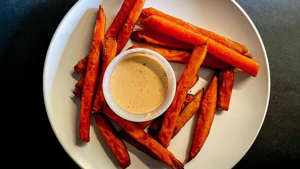 Sweet Potato Fries · Sweet Potato fries  served with jalapeno ranch dressing.