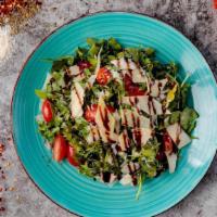 Rucola · Arugula salad with cherry tomatoes, balsamic of modena and evoo.
