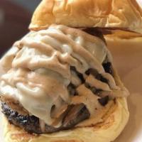 Mushroom Swiss Burger · 1/2 lb Premium burger patty topped with savory grilled onions and mushrooms and our secret b...