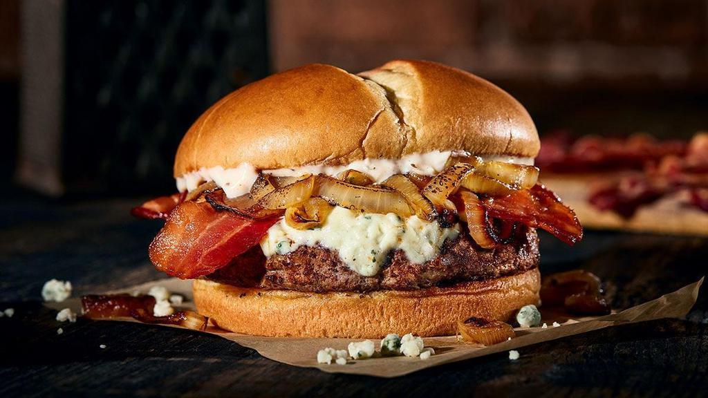The Bleu Moo · A big ‘ol Chuck Burger with blackened seasoning, bleu cheese, tasty bacon, caramelized onions and Cajun mayo. This is flavor, topped with flavor, and then some flavor.