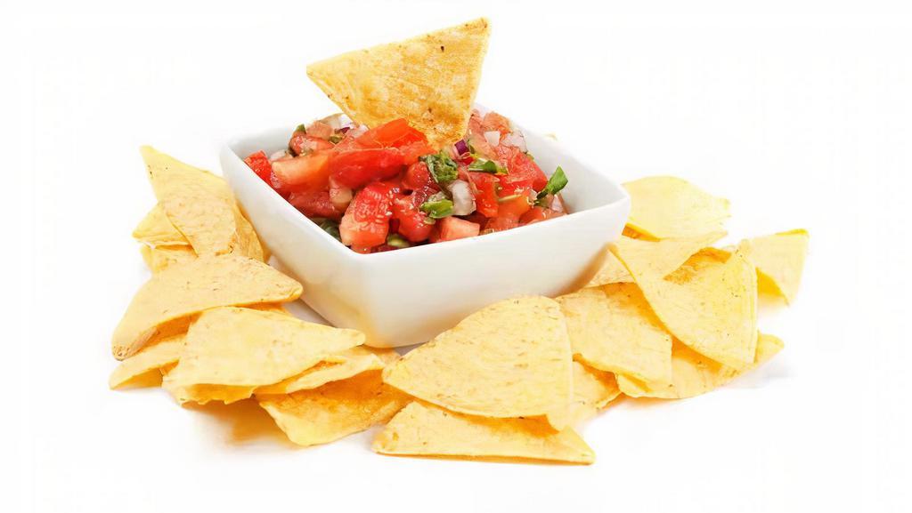 Chips & Salsa · Homemade tortilla chips with red and green salsa.