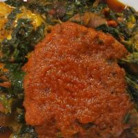 Efo Riro  · A rich stew made with spinach, palm oil, dry fish and meat.