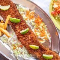 Chuletazo / Breaded Pork Loin · Crispy breaded pork tenderloin