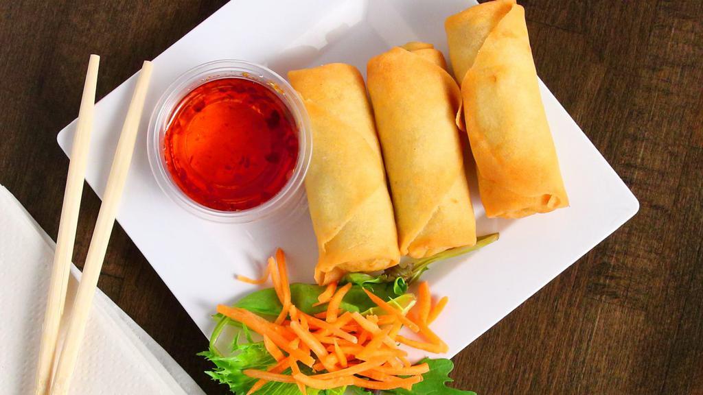 Crispy Veggie Spring Roll · Crispy fried spring roll with cabbage, carrot,green bean, mushroom,onion, vermicelli and tofu bean curb. Serve with sweet chili dipping sauce