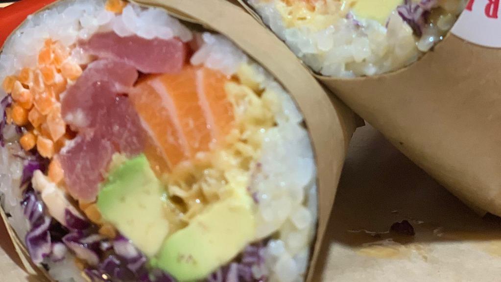Kungfu-Rrito · Fresh tuna, fresh salmon, lettuce, carrots, avocado, sriracha teriyaki, wasabi mayo, tempura flakes.