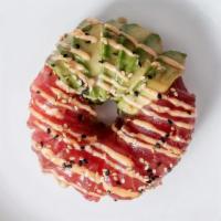 Tuna & Avocado Donut · Seasoned rice, furakaki, avocado, fresh tuna, eel sauce, spicy mayo , sesame seeds