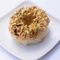 Crab Salad Donut · Seasoned rice, furakaki, crab salad, eel sauce, spicy mayo, wasabi mayo, sesame seeds
