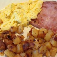 Ham Steak And Eggs · Ham steak and two eggs, and cooked any style. Served with choice of hash browns or home frie...