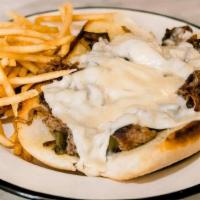 Philly Grinder Your Way Del · Shaved steak, queso, bell peppers, mushrooms and onions topped with ranch dressing.