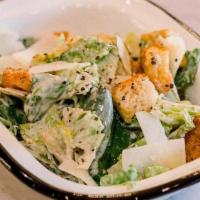 Lg Traditional Caesar Del · Romaine hearts, shaved parmesan and croutons topped with Caesar dressing.