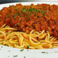 Spaghettini With Meat Sauce · Meat sauce served over a bed of spaghettini.
