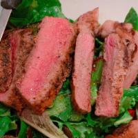 Spicy Beef Salad · Gluten-free, mild. Grilled rib eye with Thai spice serve with spring mix, mushroom, tomato, ...