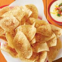 Chips & Queso · Basket of fresh tortilla chips seasoned with Fuzzy Dust and served with Queso.. {GF - please...