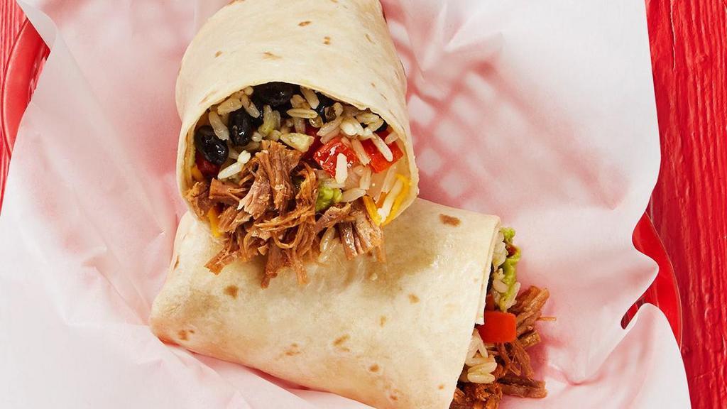 Shredded Brisket Burrito · Shredded brisket, guacamole, shredded cheese, tomatoes, onions, garlic sauce, and your choice of rice and beans wrapped in a large flour tortilla.. {DF - with cilantro-lime rice, remove shredded cheese}