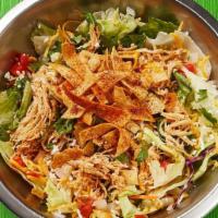 Shredded Chicken Salad · Shredded chicken served on a fresh lettuce blend topped with tomatoes, onions, shredded chee...