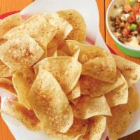 Chips & Queso With Seasoned Ground Beef · Basket of fresh tortilla chips seasoned with Fuzzy Dust and served with Queso with Seasoned ...