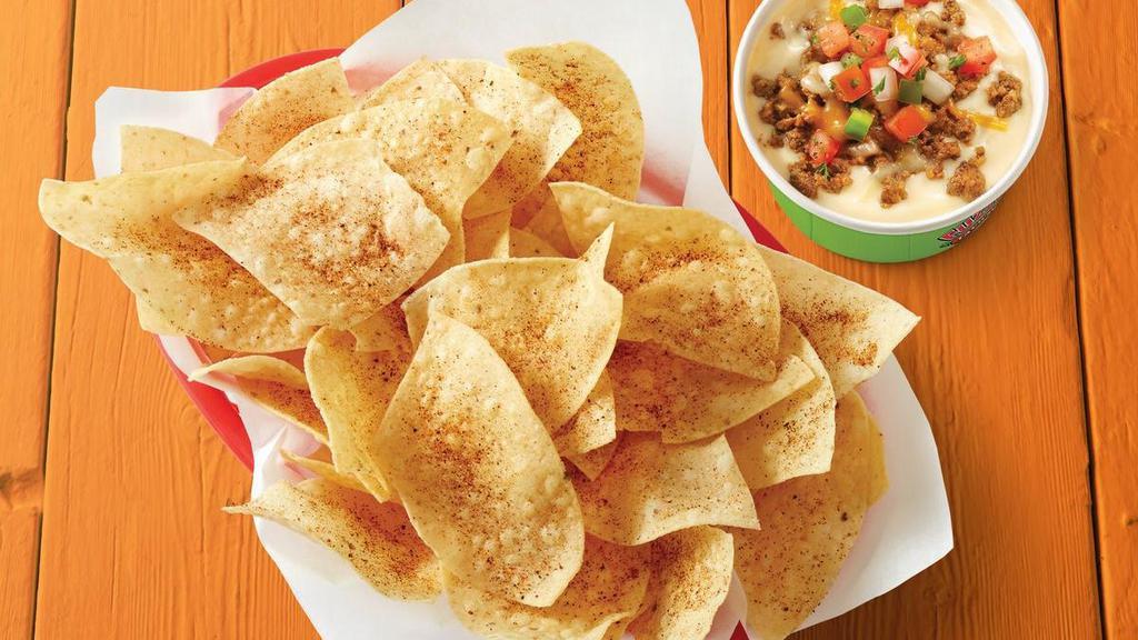 Large Chips & Queso With Seasoned Ground Beef · Basket of fresh tortilla chips seasoned with Fuzzy Dust and served with Queso with Seasoned Ground Beef.