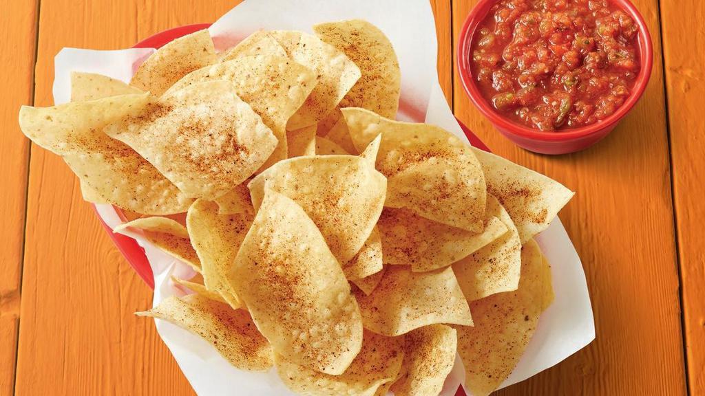Chips & Fire-Roasted Salsa · Basket of fresh tortilla chips seasoned with Fuzzy Dust and served with Fire-Roasted Salsa.. {DF}, {GF - please note that chips are fried in a fryer that may allow cross-contact in some locations}