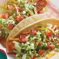 Grilled Mahi Taco · *FUZZY'S FAVORITE - Grilled Mahi served on a soft corn tortilla and topped with garlic sauce...