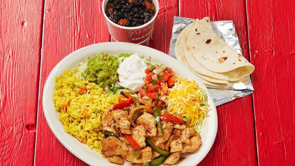 Fajita Chicken Plate  · Served with three flour tortillas, guacamole, lettuce, sour cream, shredded cheese, pico de gallo, grilled peppers and onions with your choice of 2 sides.. {DF - remove shredded cheese and sour cream}