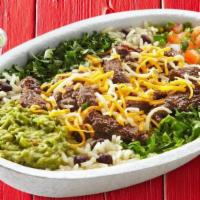Fajita Beef Burrito Bowl · Fajita beef, lettuce, rice, beans, guacamole, pico de gallo, shredded cheese, garlic sauce,,...