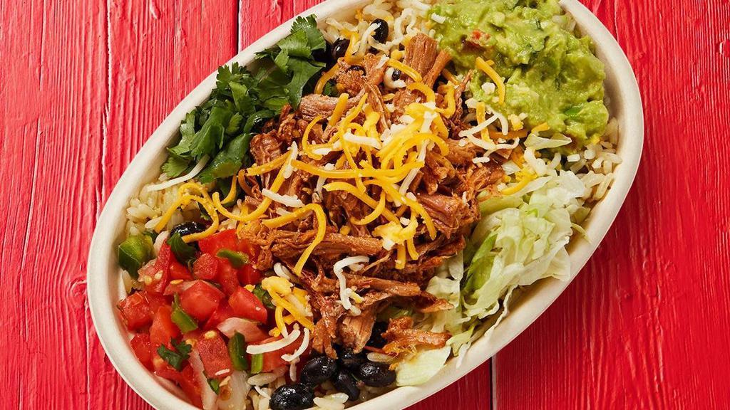Shredded Brisket Burrito Bowl · Shredded brisket, lettuce, rice, beans, guacamole, pico de gallo, shredded cheese, garlic sauce, and topped with fire-roasted salsa or spicy chimichurri.