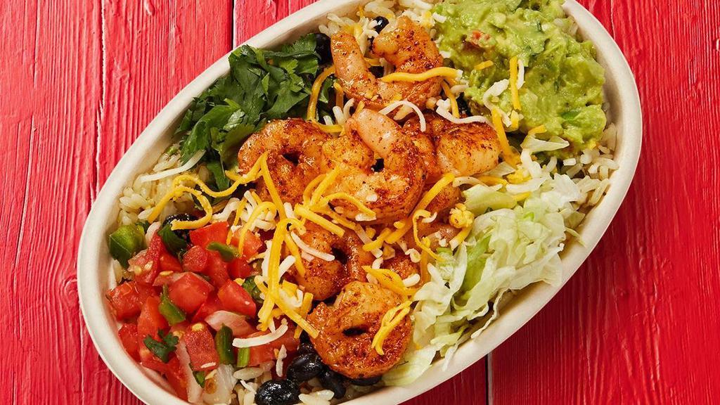 Grilled Shrimp Burrito Bowl · Grilled shrimp, lettuce, rice, beans, guacamole, pico de gallo, shredded cheese, garlic sauce, and topped with fire-roasted salsa or spicy chimichurri.