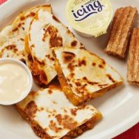Kids' Cheeseburger Quesadilla · Special ground beef & cheese-stuffed flour tortilla served with queso or ranch dip and a sna...
