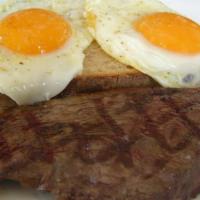 Steak & Eggs · Six ounces. Top sirloin steak with two eggs any style served with toast.